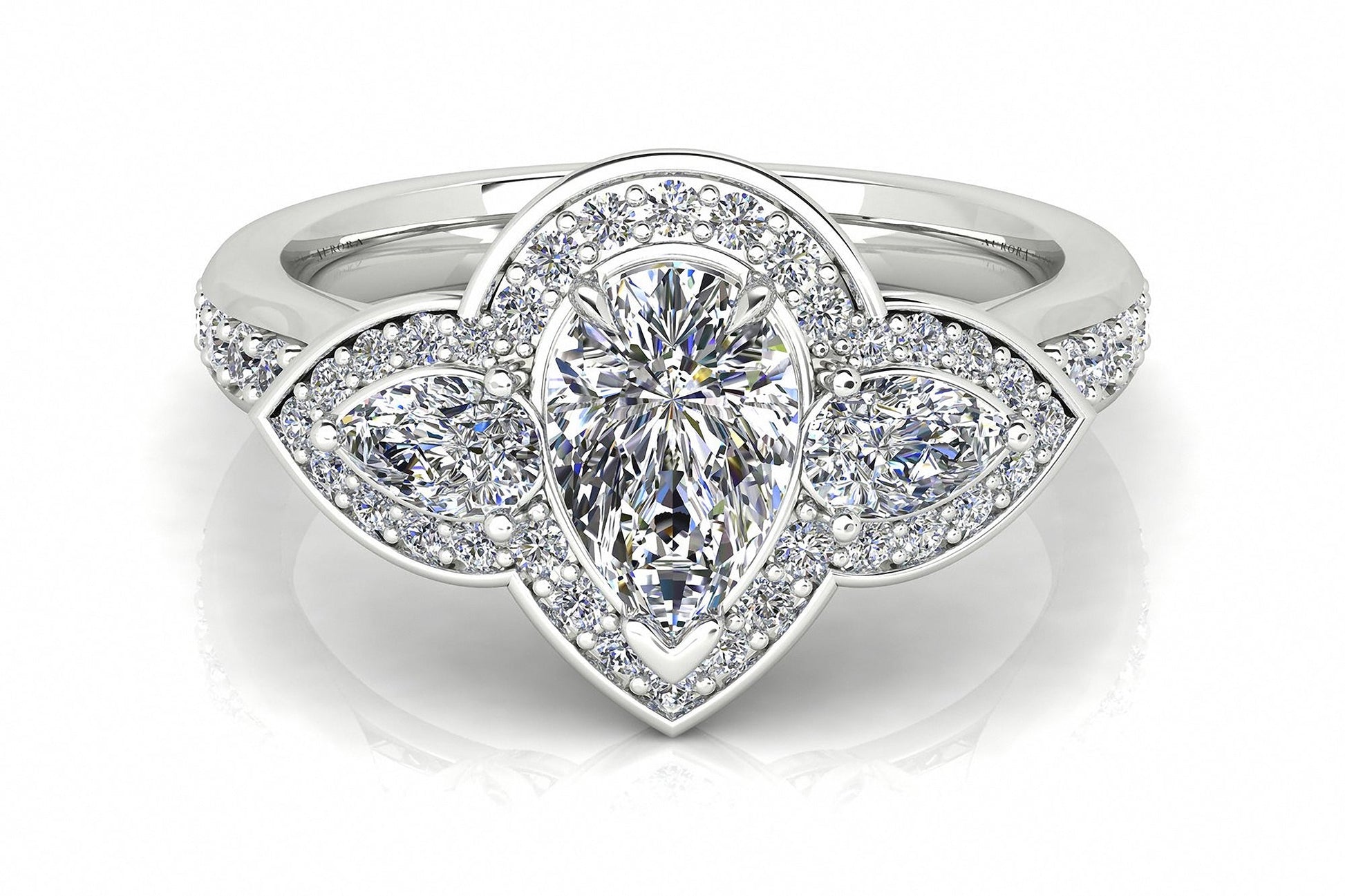 Pear Shape Aurora Diamond 3 Stone Halo Ring  Gardiner Brothers