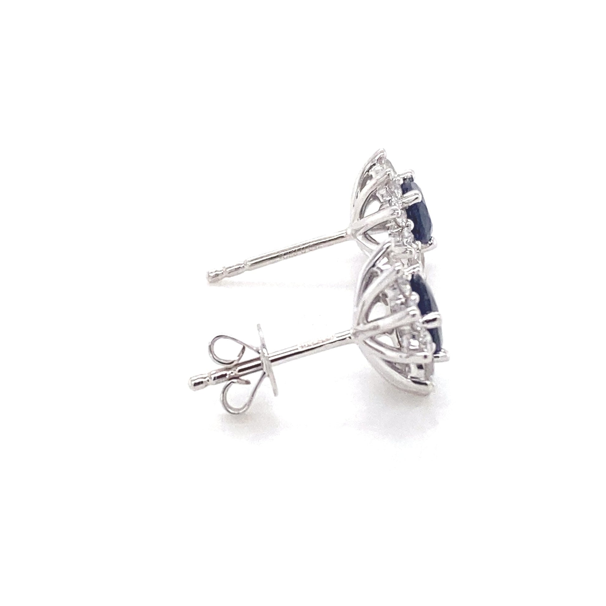 Sapphire and round brilliant cut diamond cluster style earrings  Gardiner Brothers   