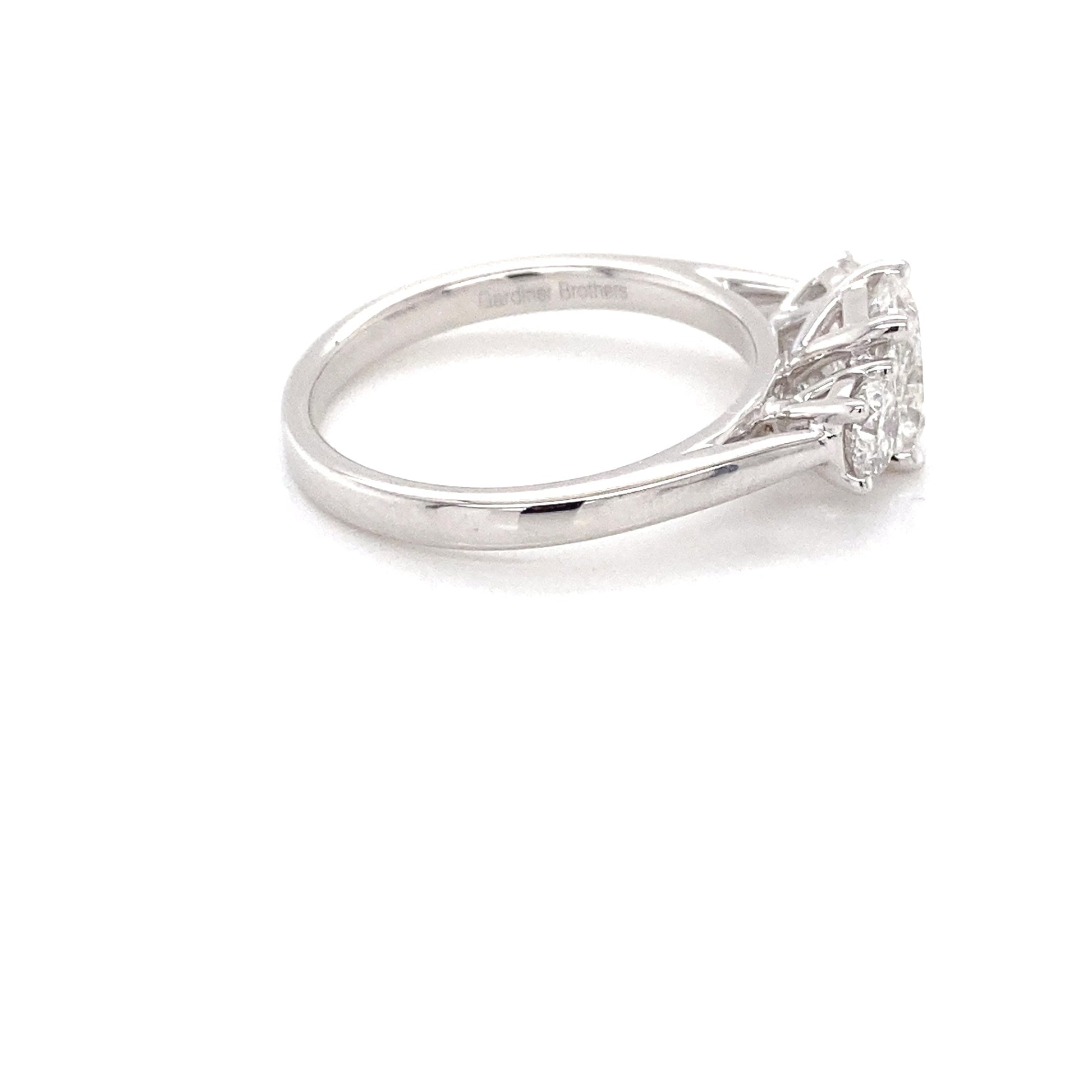 Platinum Cushion and round brilliant cut diamond 3 stone ring - 1.52cts Gardiner Brothers