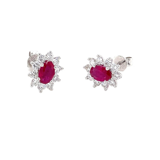 Oval Ruby and round brilliant cut diamond cluster style earrings  Gardiner Brothers   