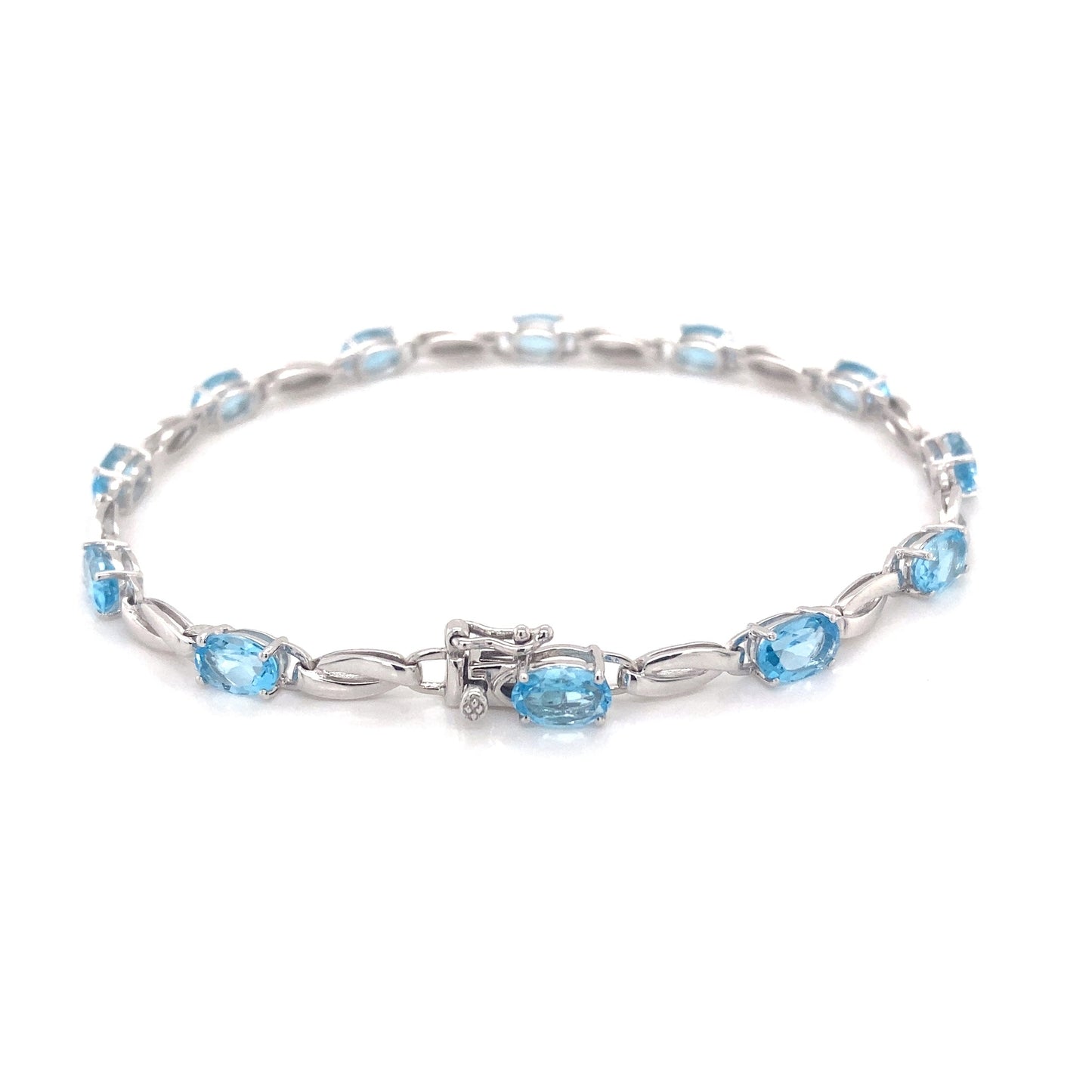 Swiss Blue Topaz and white gold bracelet  Gardiner Brothers   