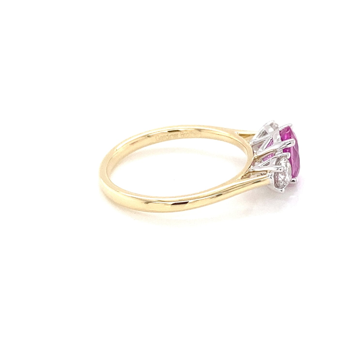 Oval Shaped Pink Sapphire and Round Brilliant Cut Diamond 3 Stone Ring Gardiner Brothers