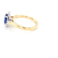 Tanzanite and round brilliant cut diamond halo ring Gardiner Brothers