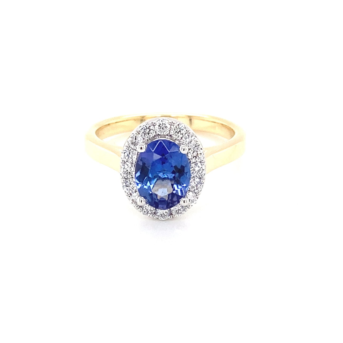 Tanzanite and round brilliant cut diamond halo ring Gardiner Brothers