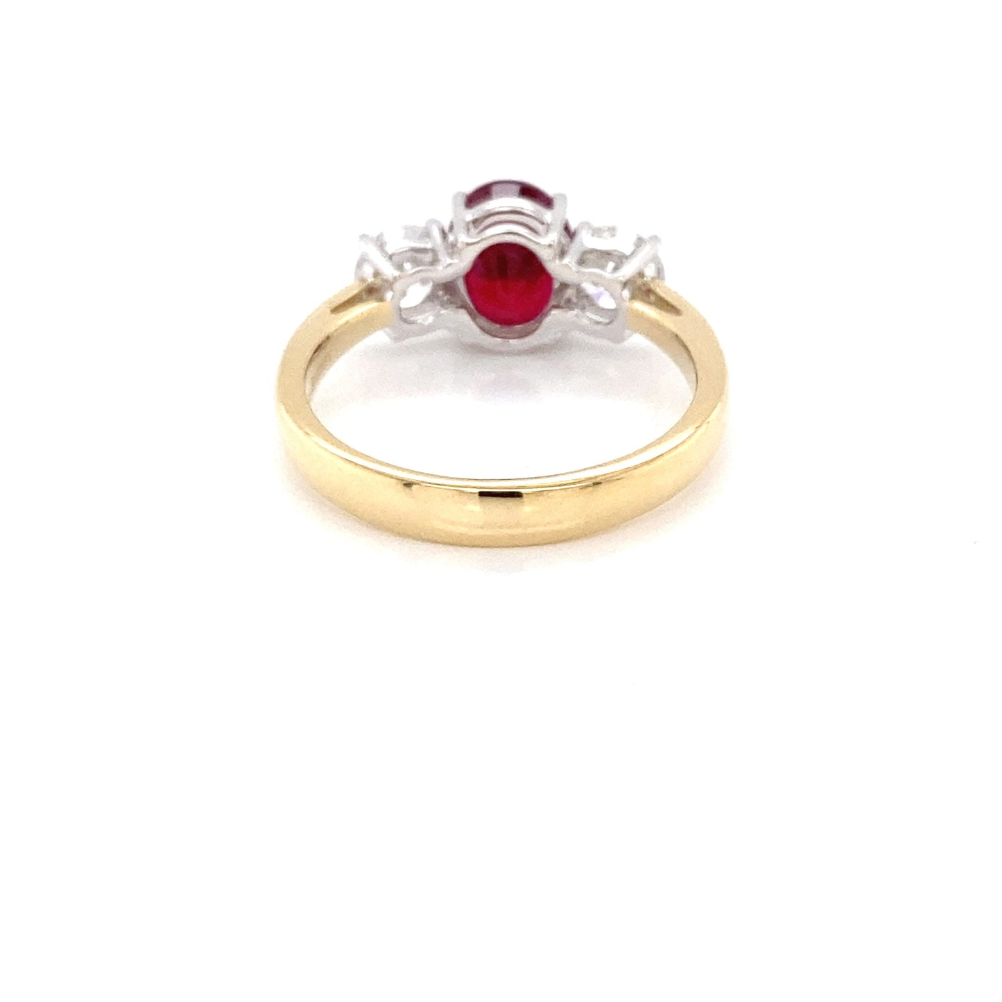 Oval Shaped Ruby and round brilliant cut diamond 3 stone ring Gardiner Brothers