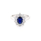 Oval shaped sapphire and round brilliant cut diamond cluster ring Gardiner Brothers