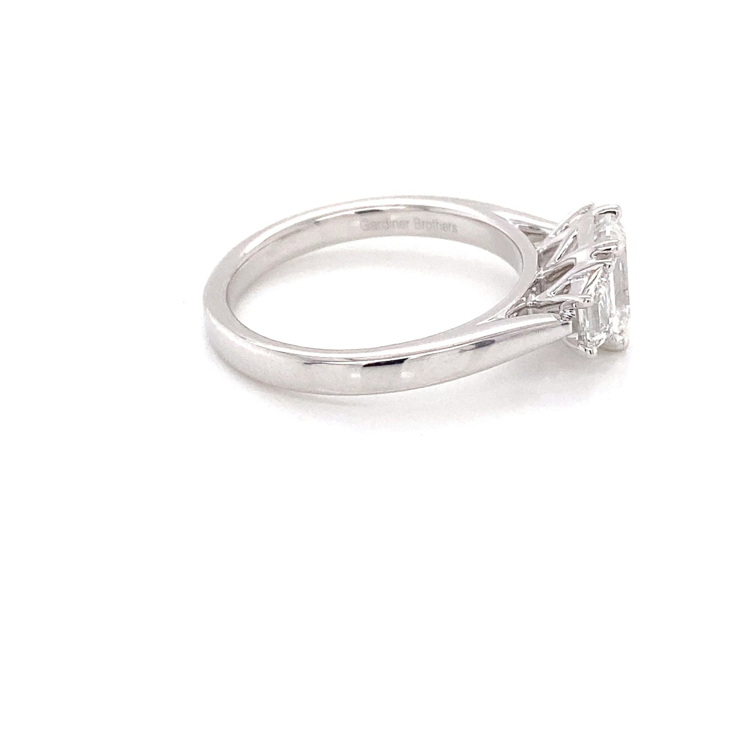Platinum Emerald and Step Cut Trapezoid Diamond 3 Stone ring - 1.40cts Gardiner Brothers