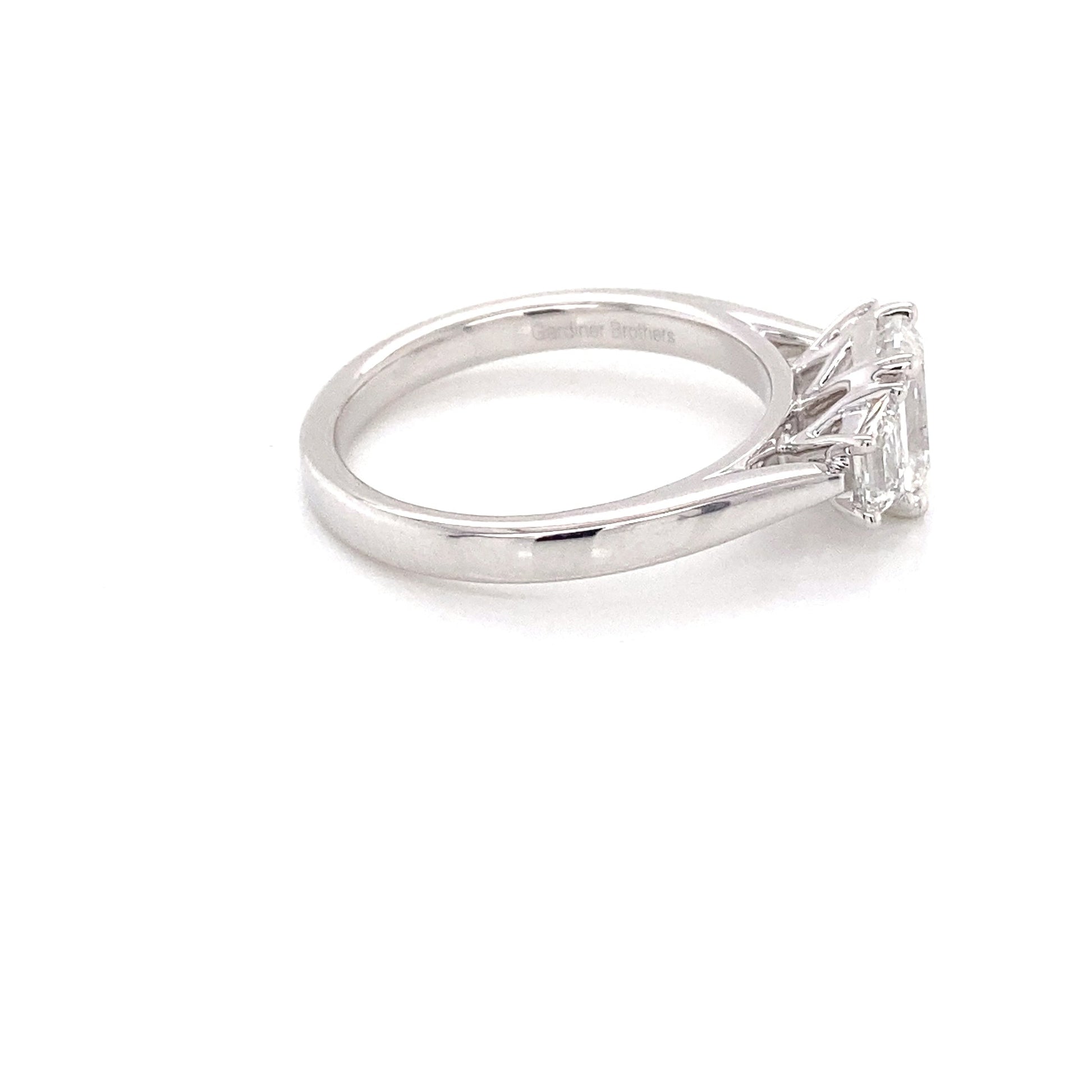 Platinum Emerald and Step Cut Trapezoid Diamond 3 Stone ring - 1.40cts Gardiner Brothers