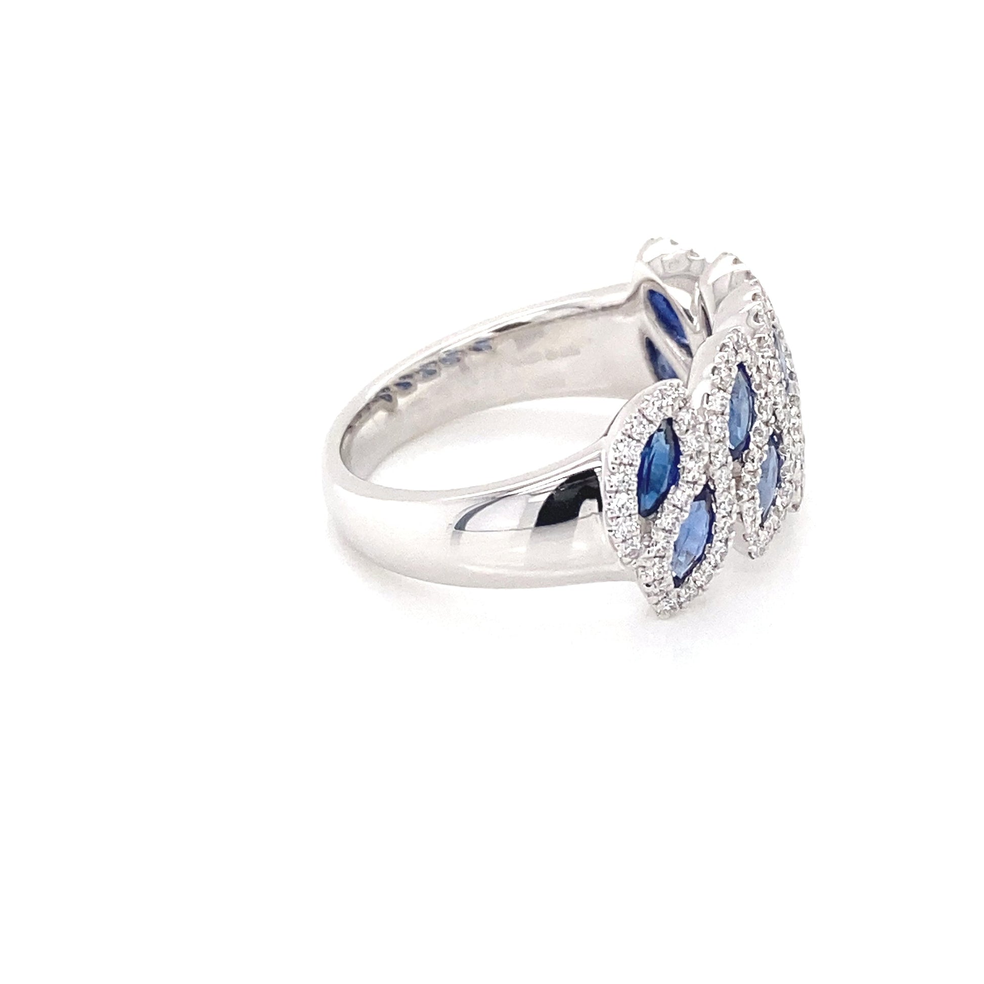 Marquise shaped Sapphire and round brilliant cut diamond dress ring Gardiner Brothers