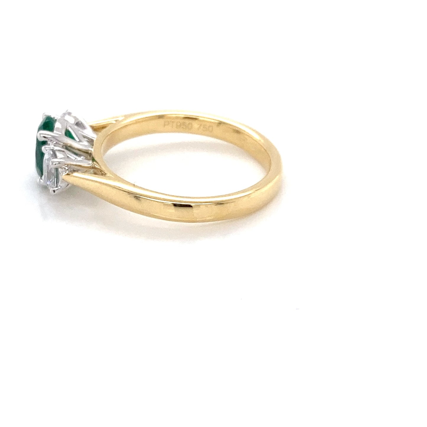 Oval Shaped Emerald and oval shaped diamond 3 stone ring Gardiner Brothers