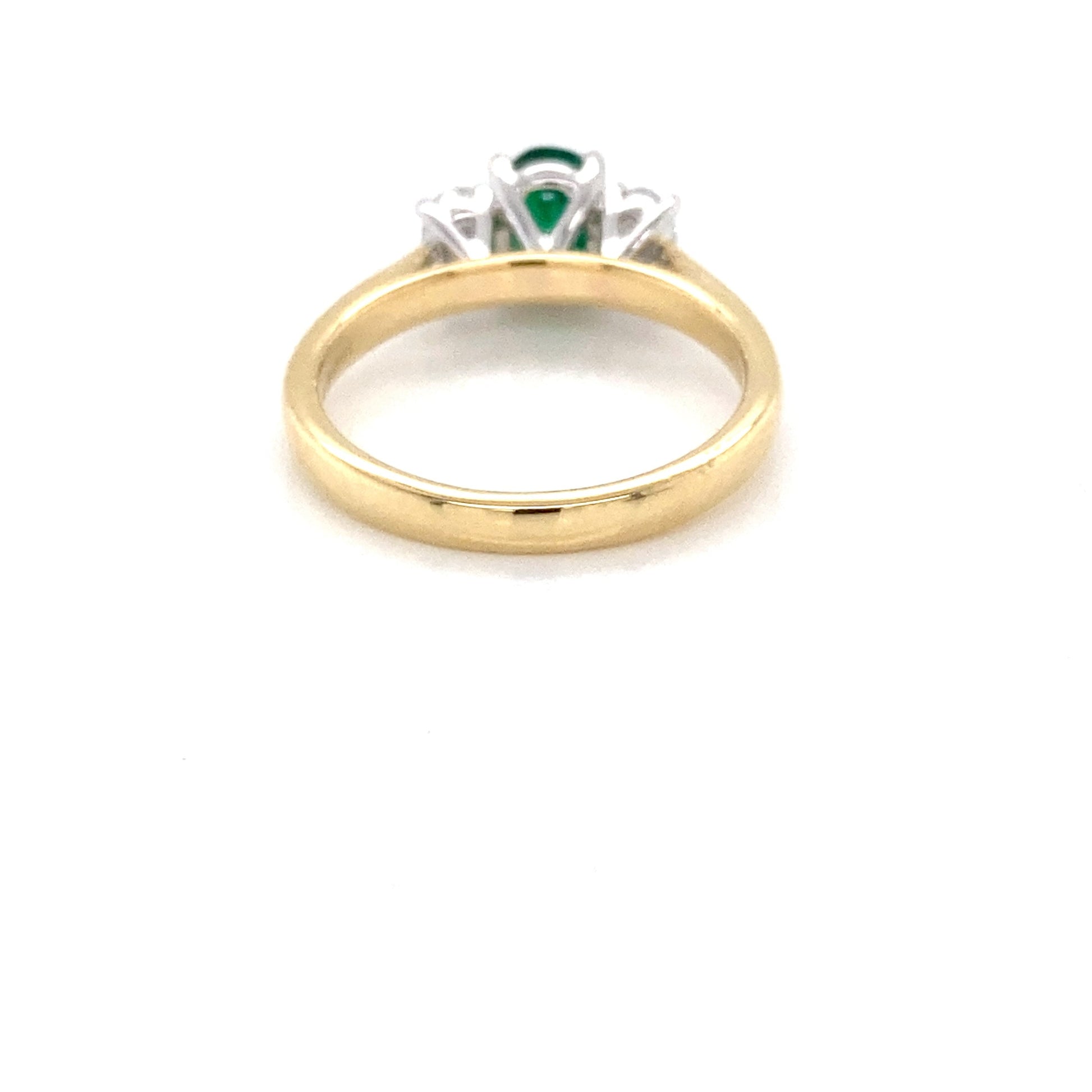 Oval Shaped Emerald and oval shaped diamond 3 stone ring Gardiner Brothers