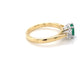 Oval Shaped Emerald and oval shaped diamond 3 stone ring Gardiner Brothers