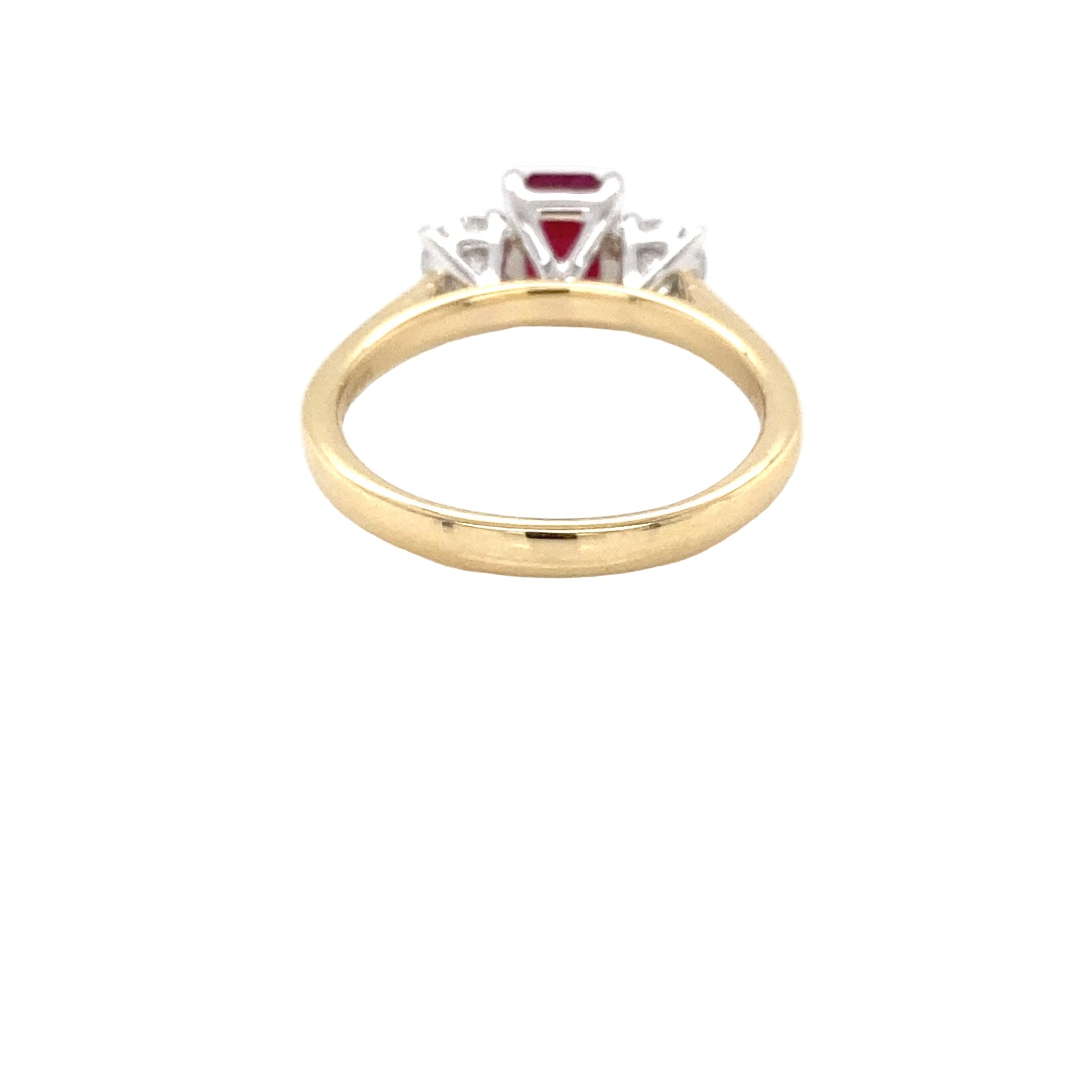 Octagonal Ruby and round brilliant cut diamond 3 stone ring Gardiner Brothers