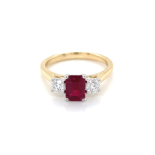 Octagonal Ruby and round brilliant cut diamond 3 stone ring Gardiner Brothers