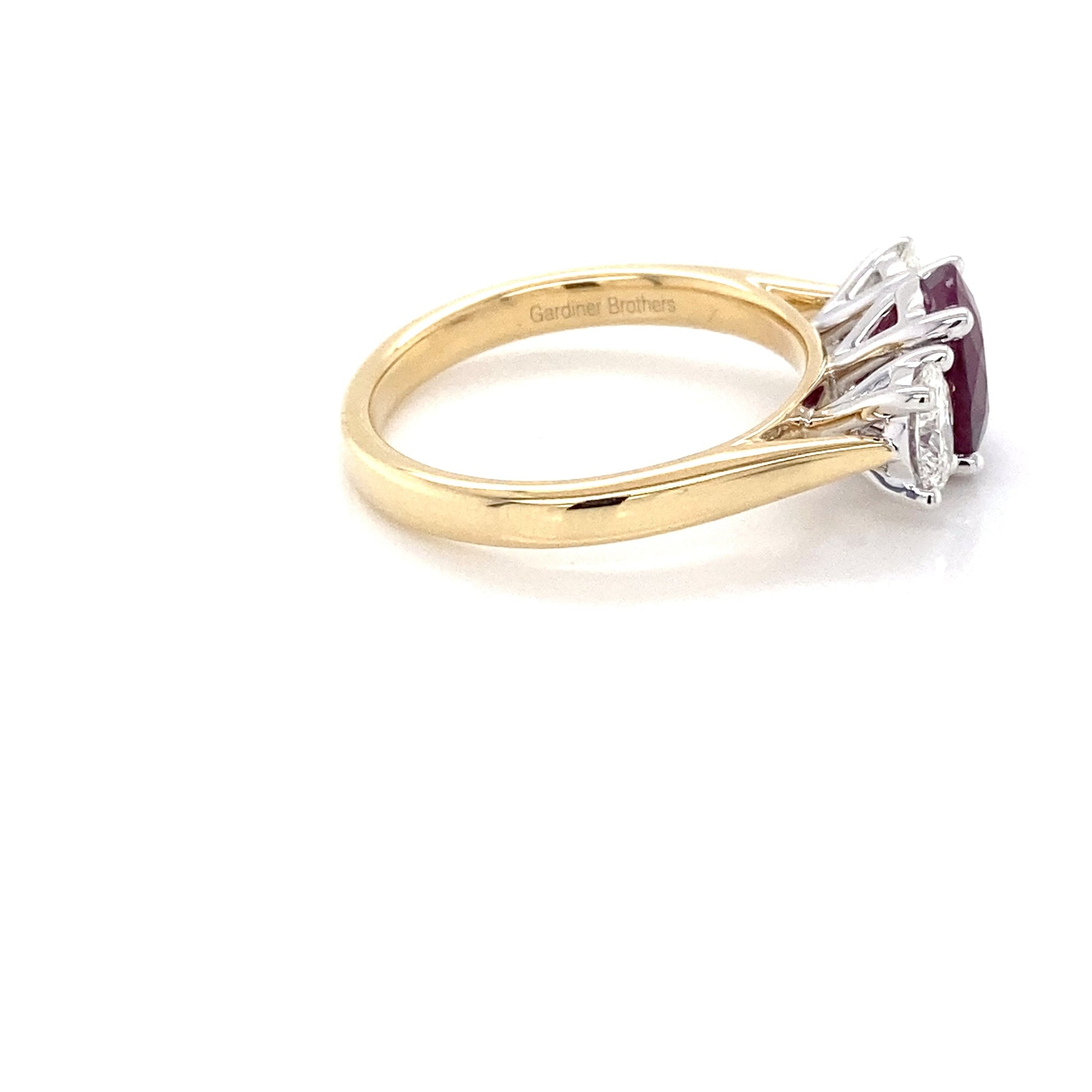 Oval Shaped Ruby and Oval diamond 3 stone ring Gardiner Brothers