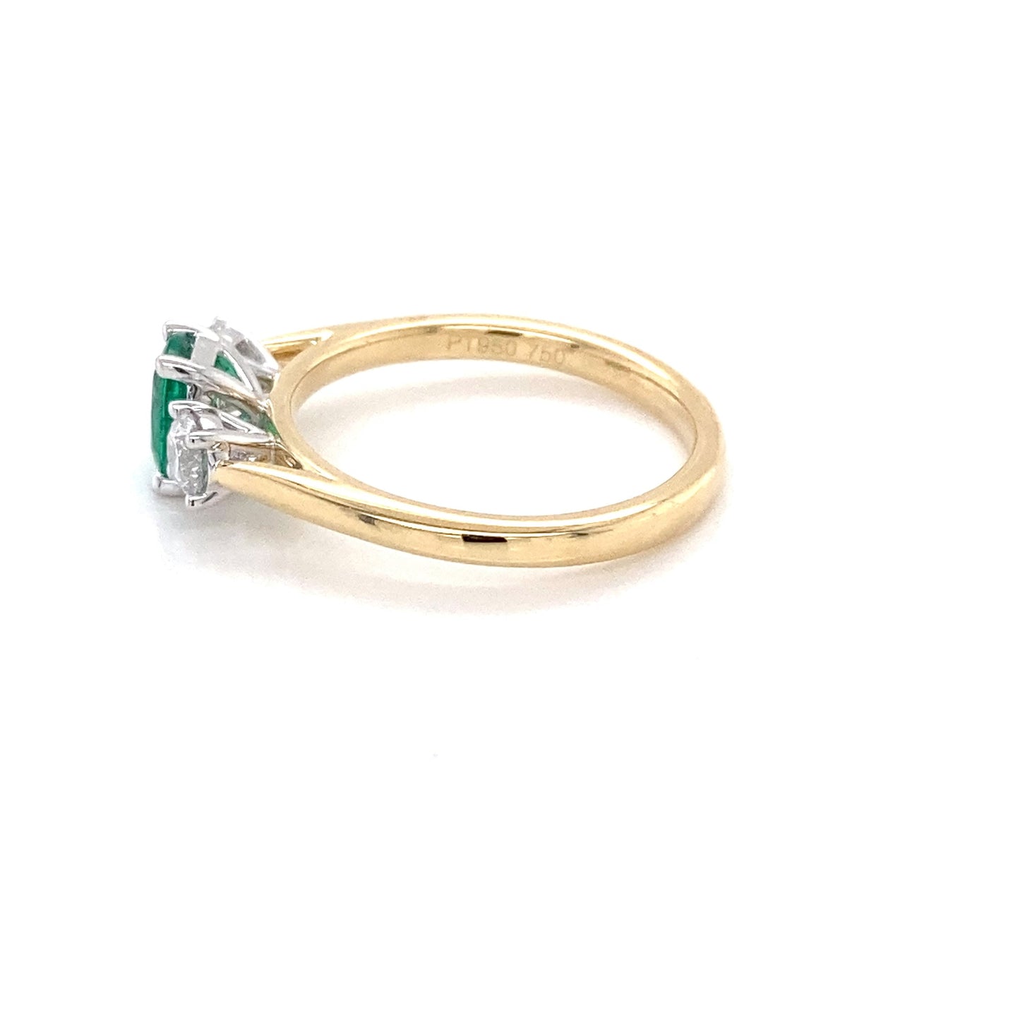 Cushion Shaped emerald and round brilliant cut diamond 3 stone ring Gardiner Brothers