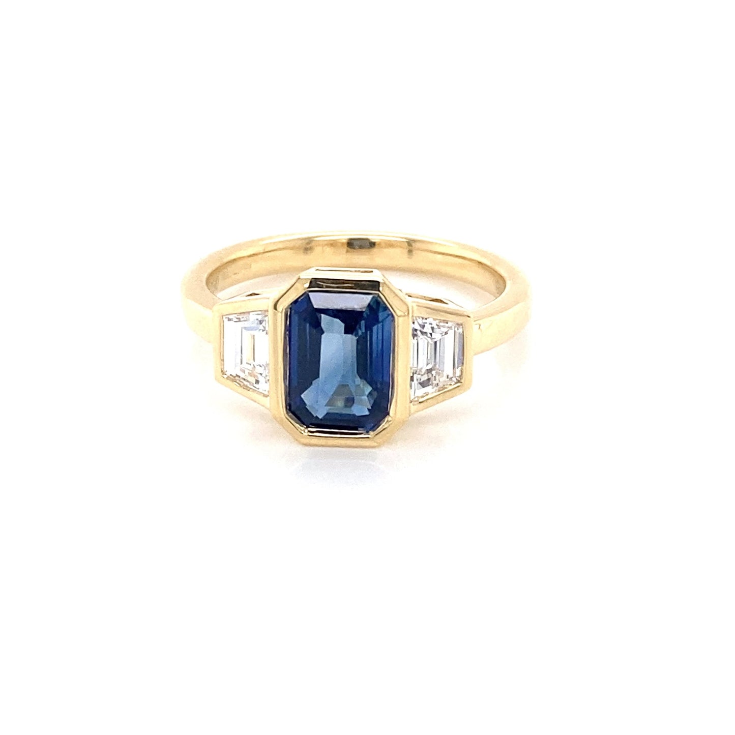 Octagonal Sapphire and Trapezoid diamond 3 stone ring Gardiner Brothers