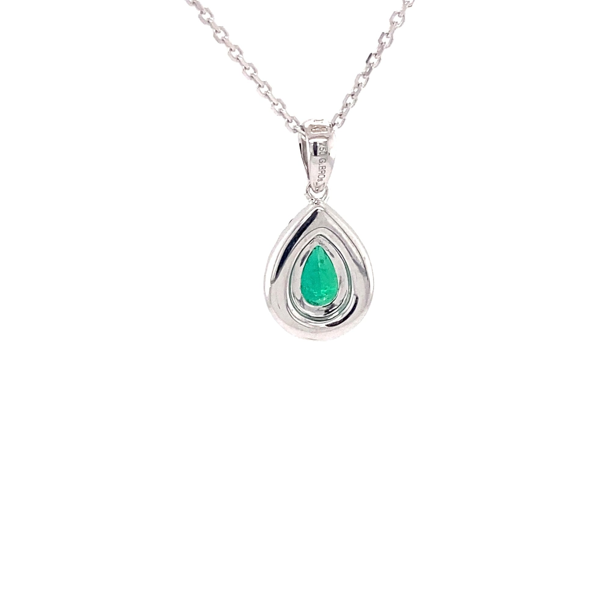 Pear Shaped emerald and brilliant cut diamond halo style pendant Gardiner Brothers