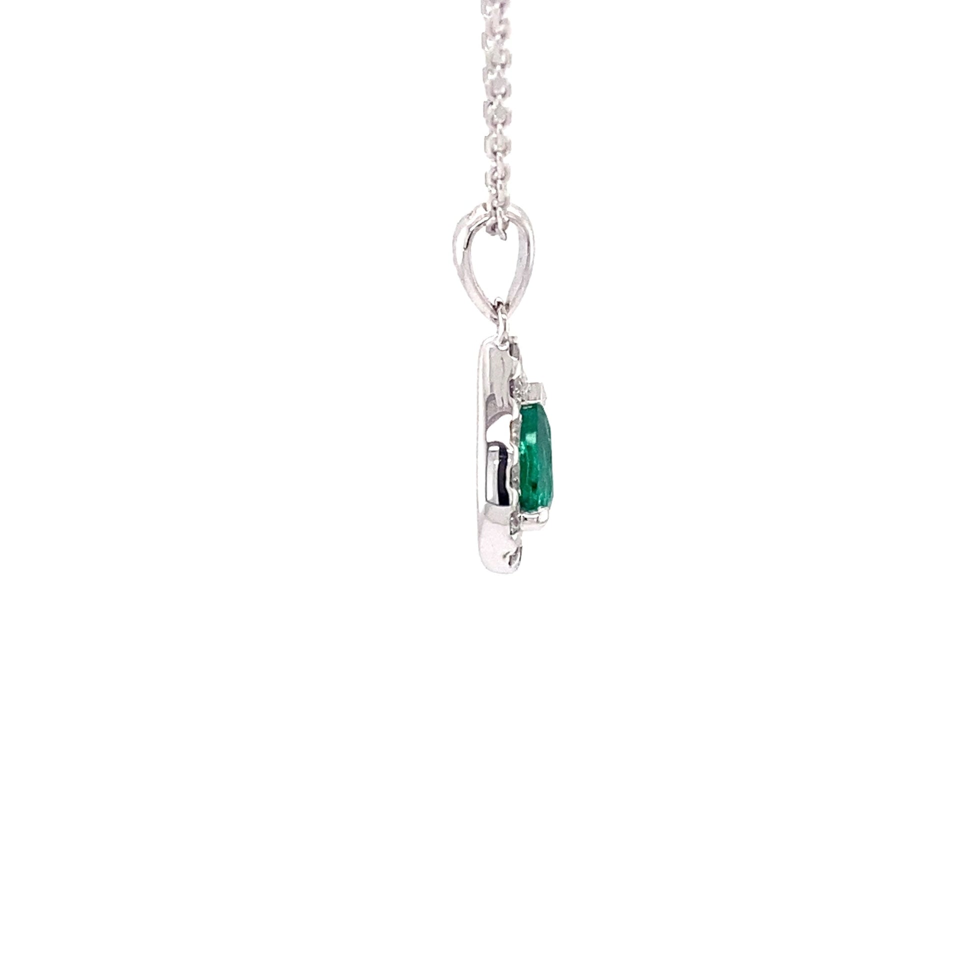 Pear Shaped emerald and brilliant cut diamond halo style pendant Gardiner Brothers