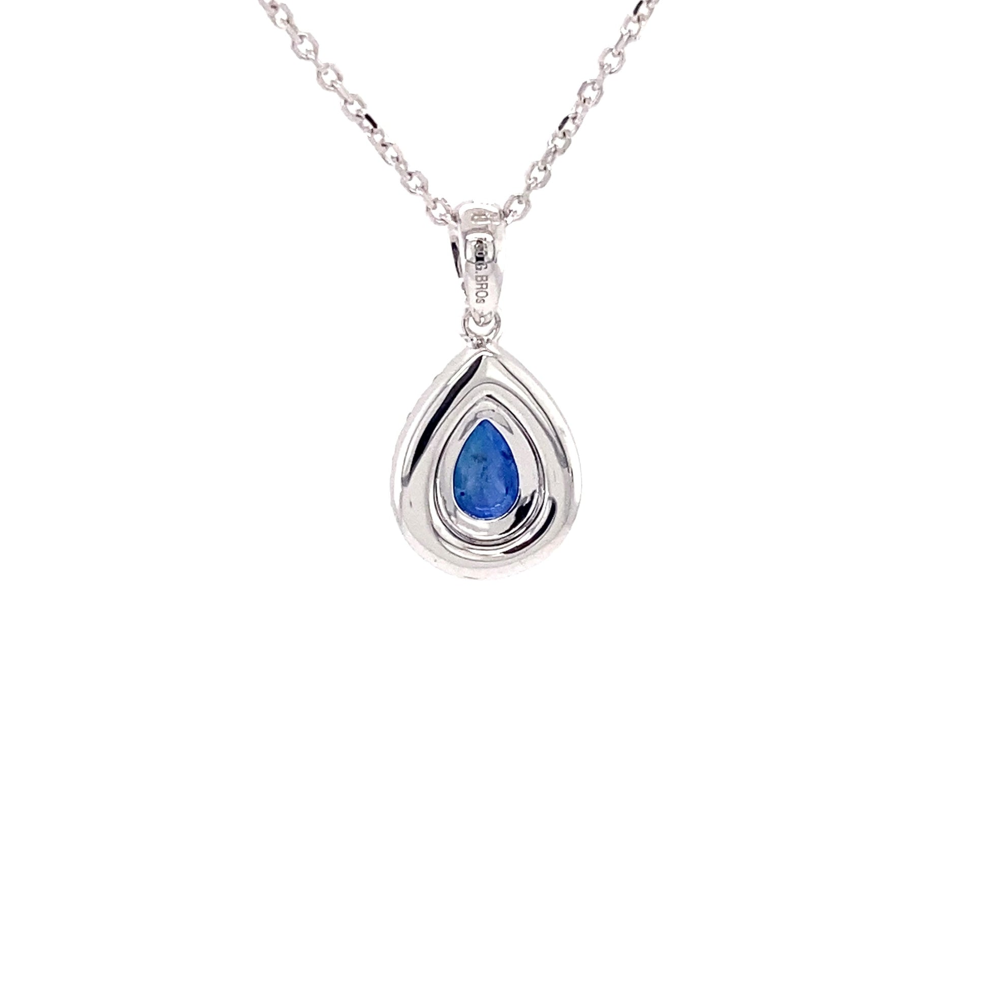 Pear Shaped Sapphire and diamond halo style pendant Gardiner Brothers