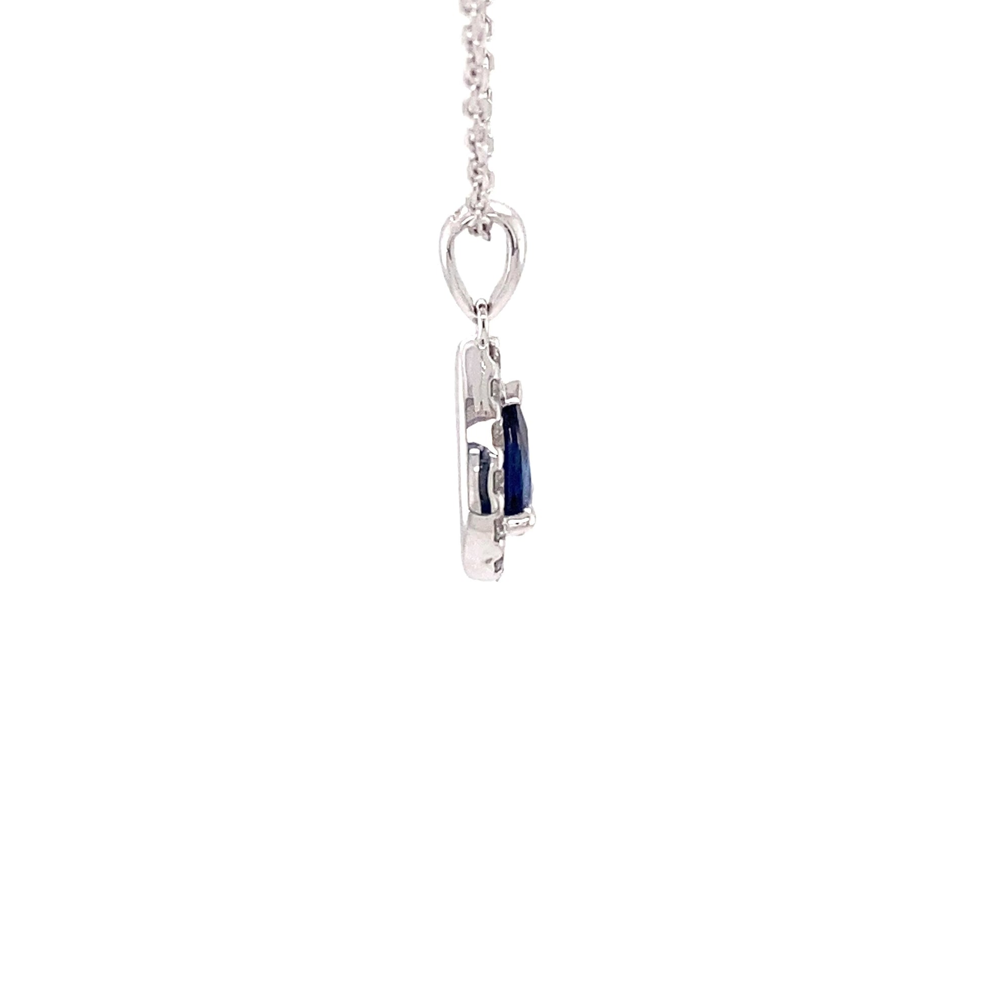 Pear Shaped Sapphire and diamond halo style pendant Gardiner Brothers