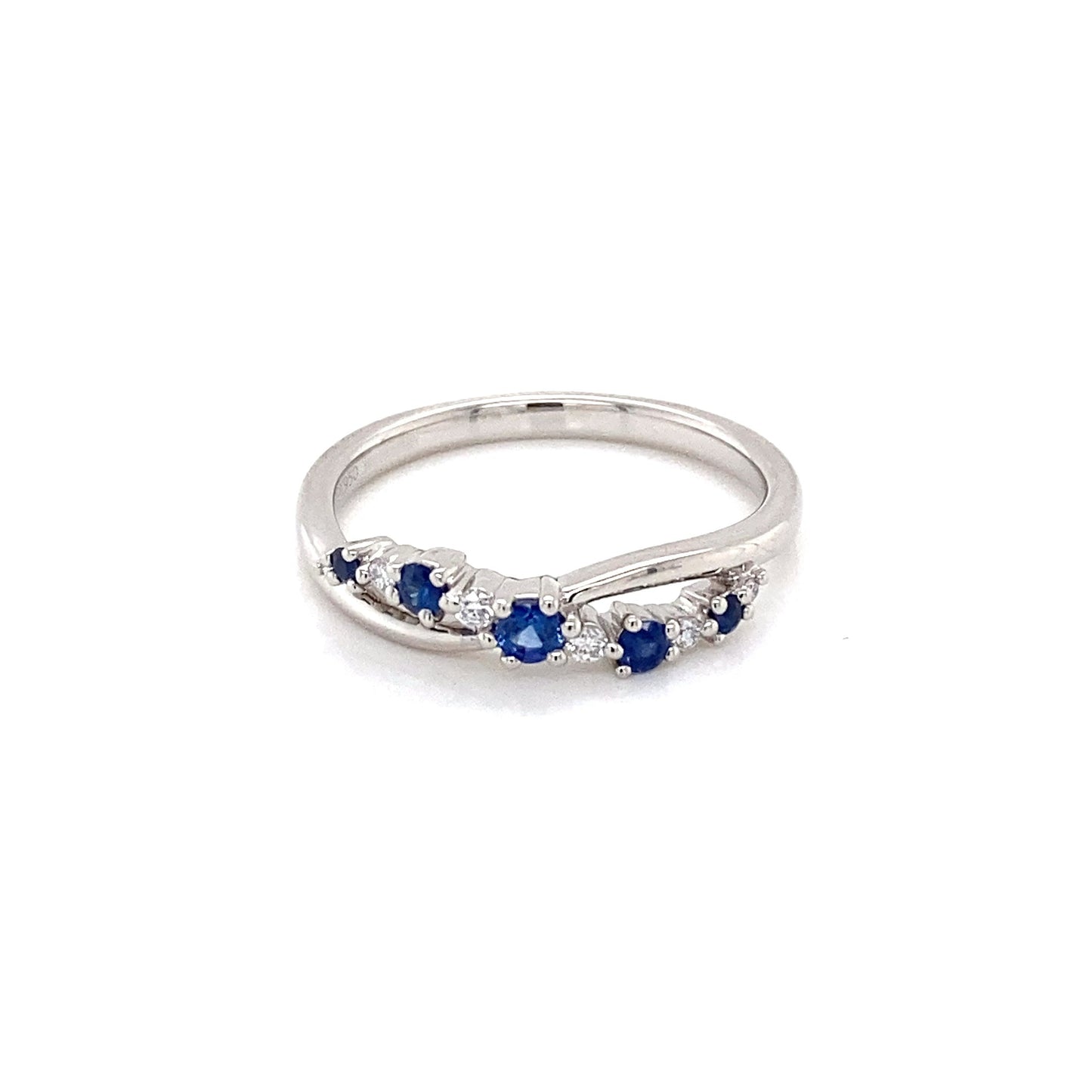 Sapphire and round brilliant cut diamond cross-over style ring Gardiner Brothers