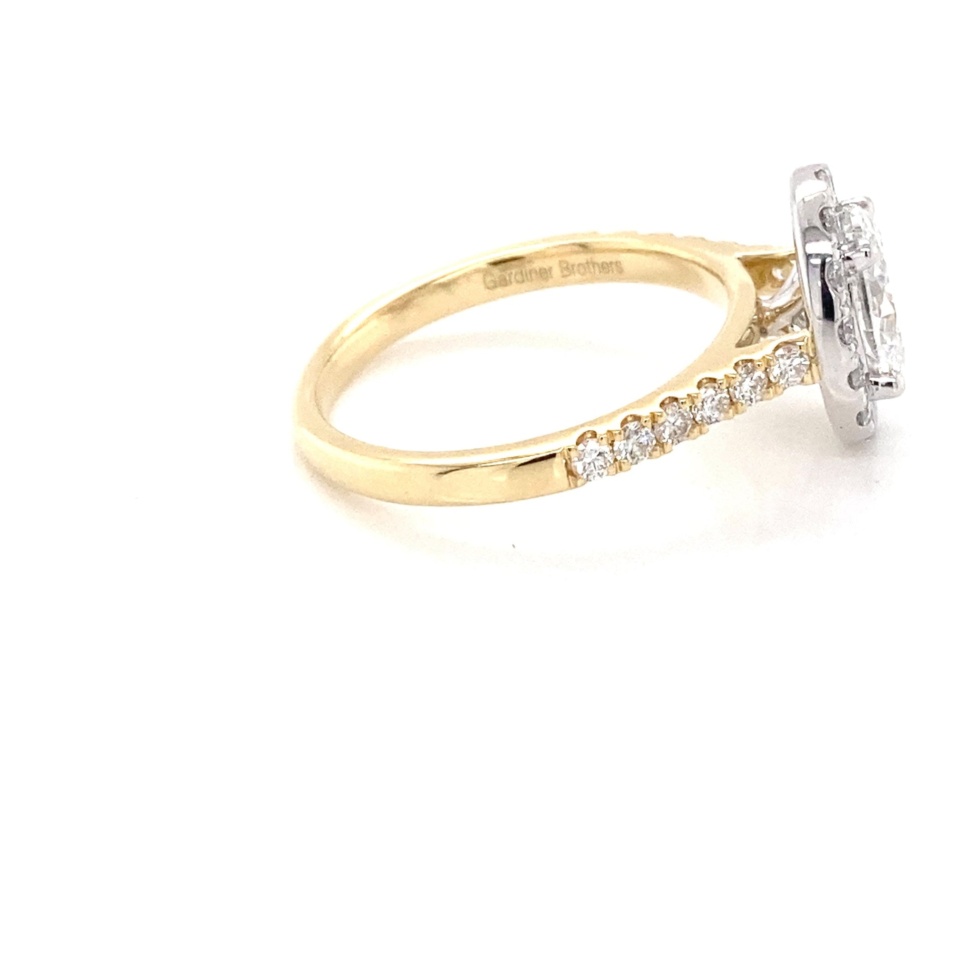 Yellow Gold Oval Shaped Diamond Halo cluster style ring - 1.57cts Gardiner Brothers