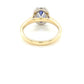 Oval Shaped Tanzanite and round brilliant cut diamond halo ring Gardiner Brothers