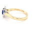 Oval Shaped Sapphire and round brilliant cut diamond halo ring Gardiner Brothers