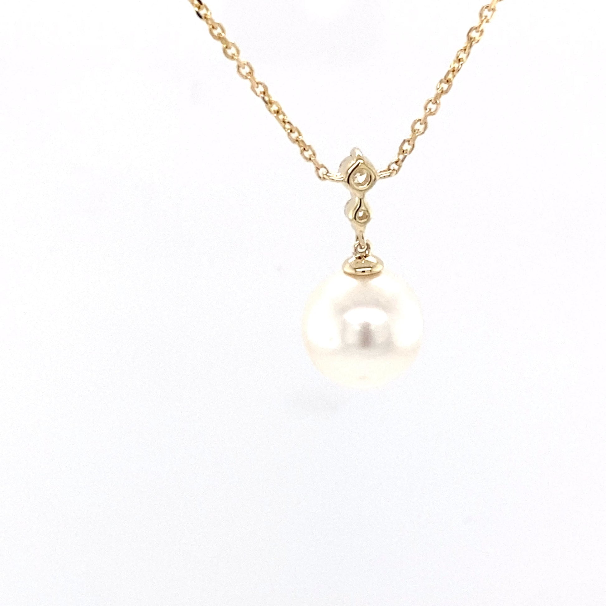 Akoya pearl and round brilliant cut diamond drop pendant Gardiner Brothers