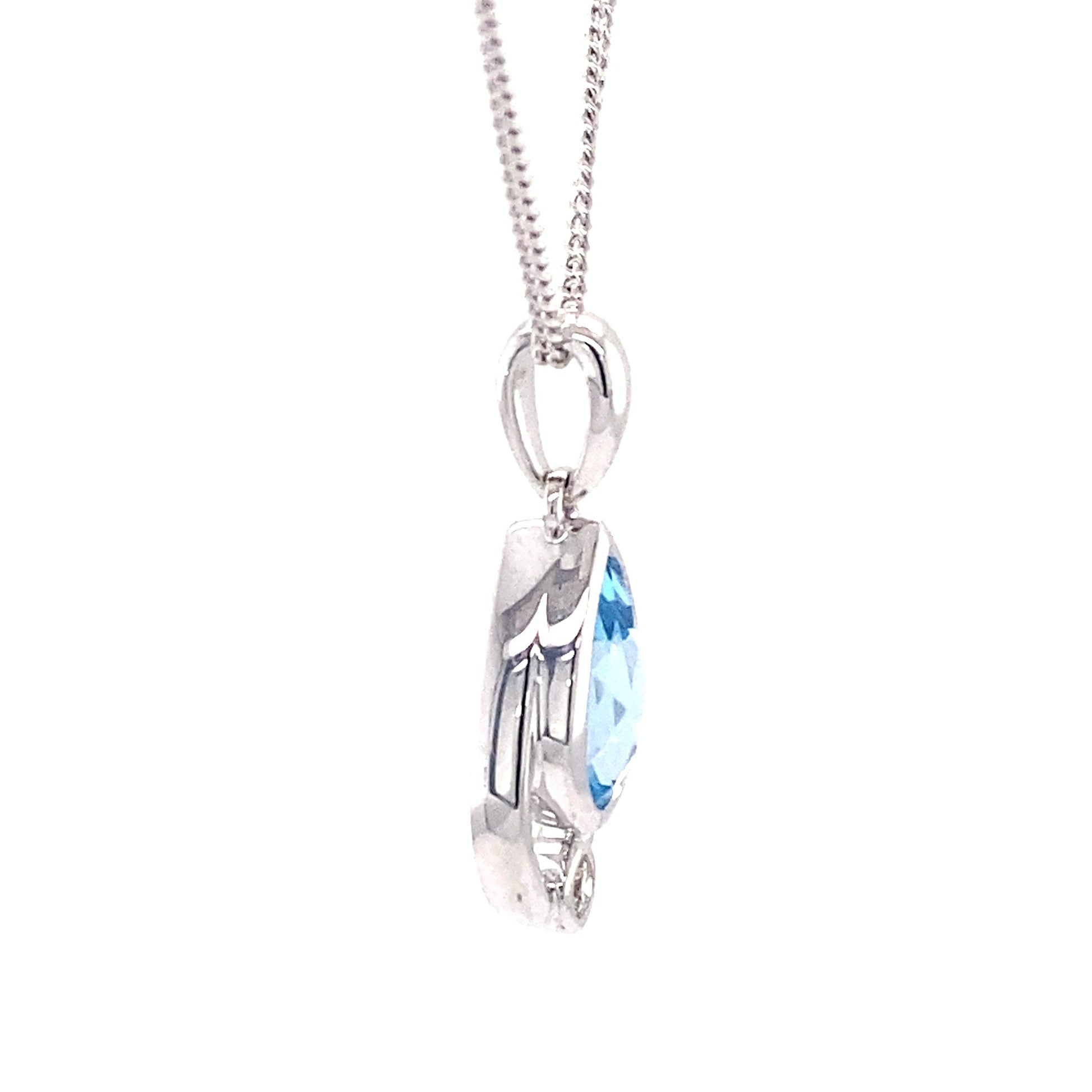 Pear Shaped Topaz and round brilliant cut diamond pendant Gardiner Brothers