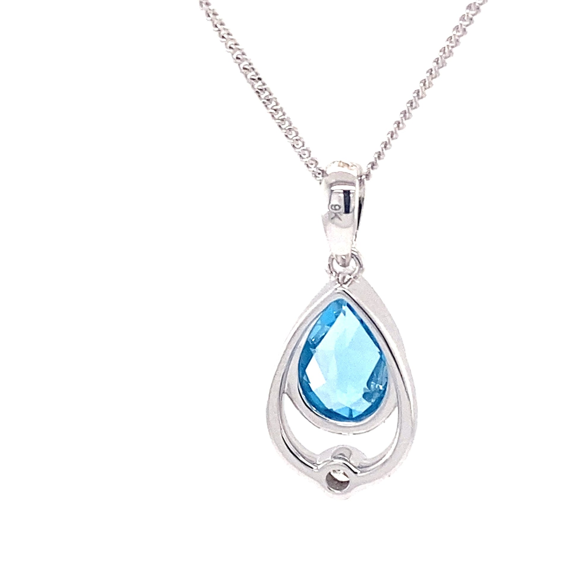 Pear Shaped Topaz and round brilliant cut diamond pendant Gardiner Brothers
