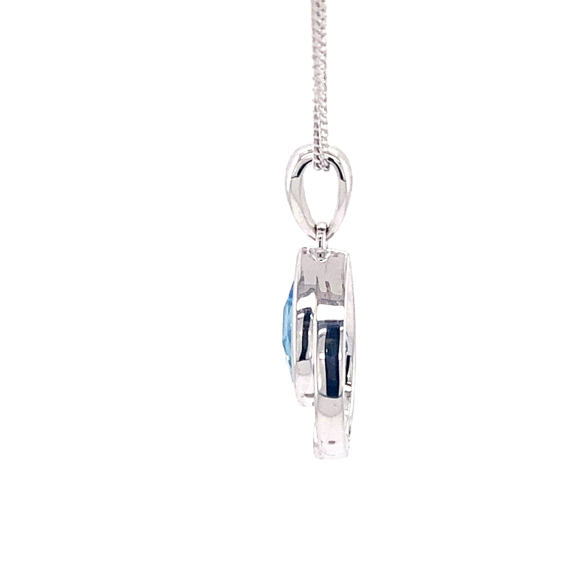 Pear Shaped Topaz and round brilliant cut diamond pendant Gardiner Brothers
