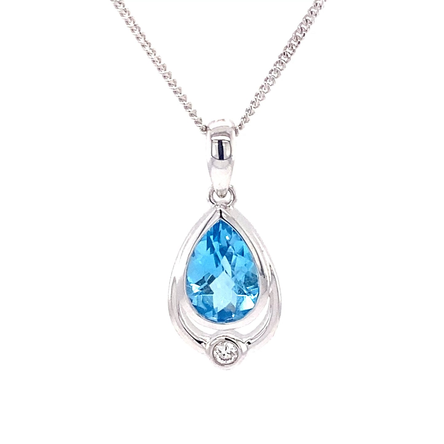 Pear Shaped Topaz and round brilliant cut diamond pendant Gardiner Brothers