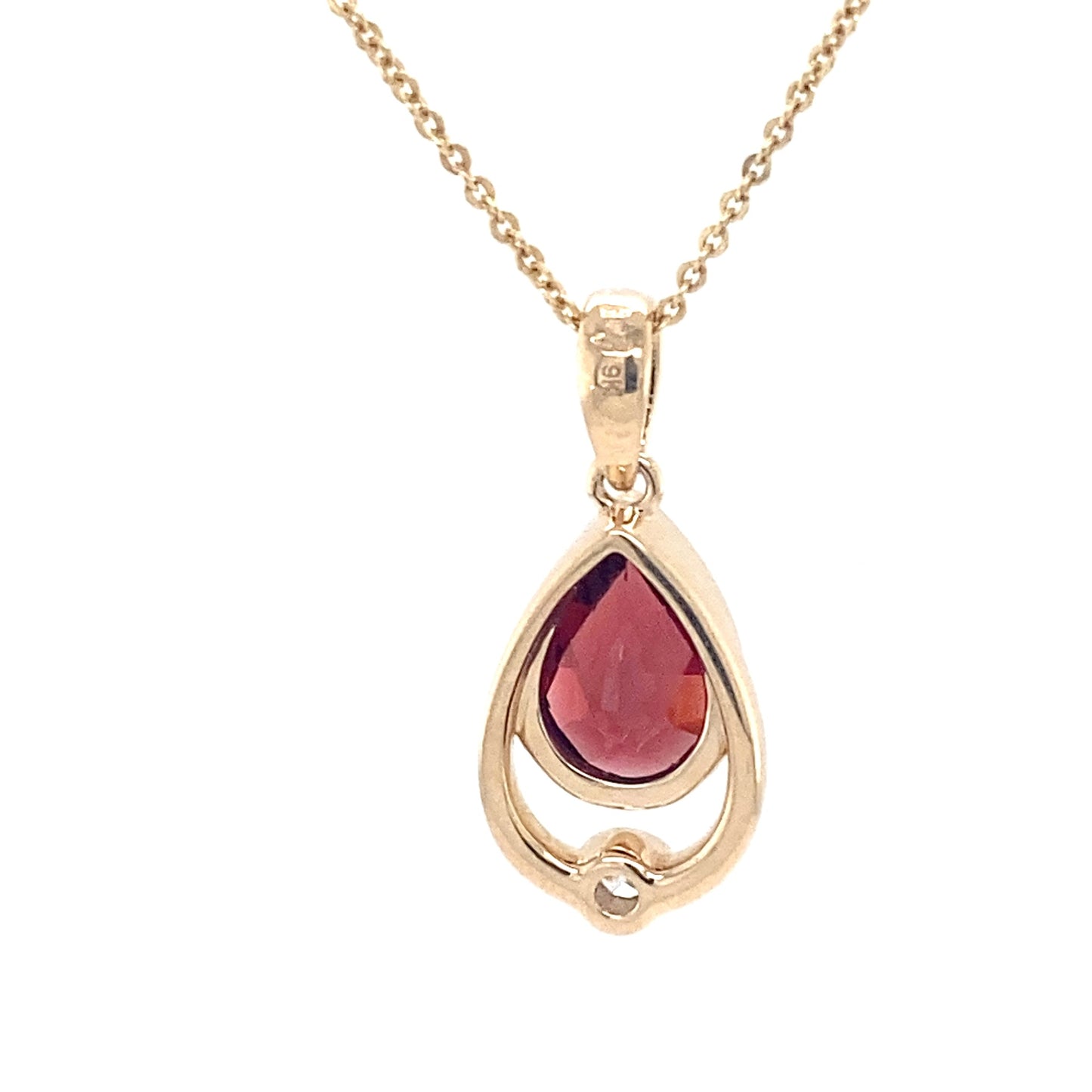 Pear shaped garnet and round brilliant cut diamond pendant Gardiner Brothers