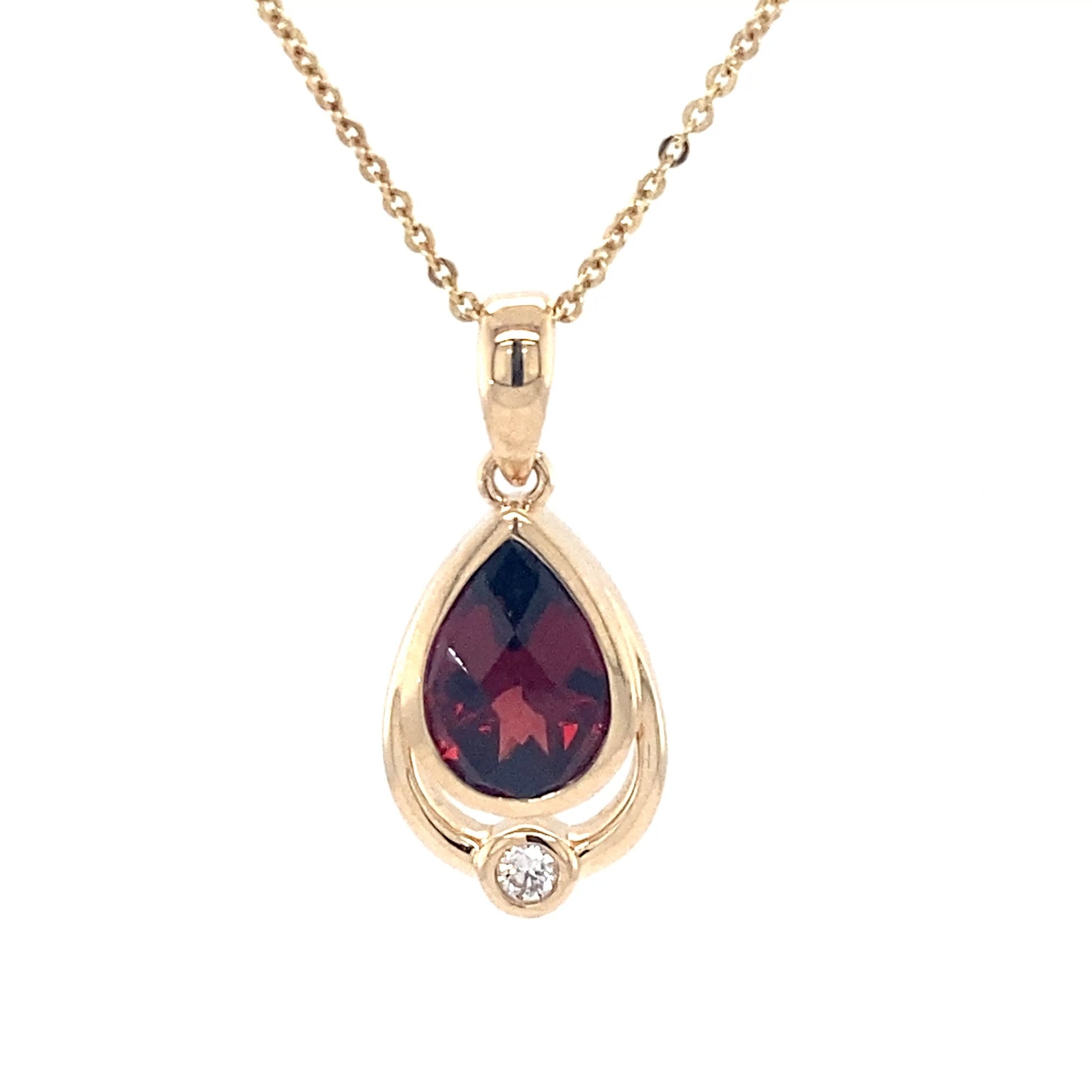 Pear shaped garnet and round brilliant cut diamond pendant Gardiner Brothers