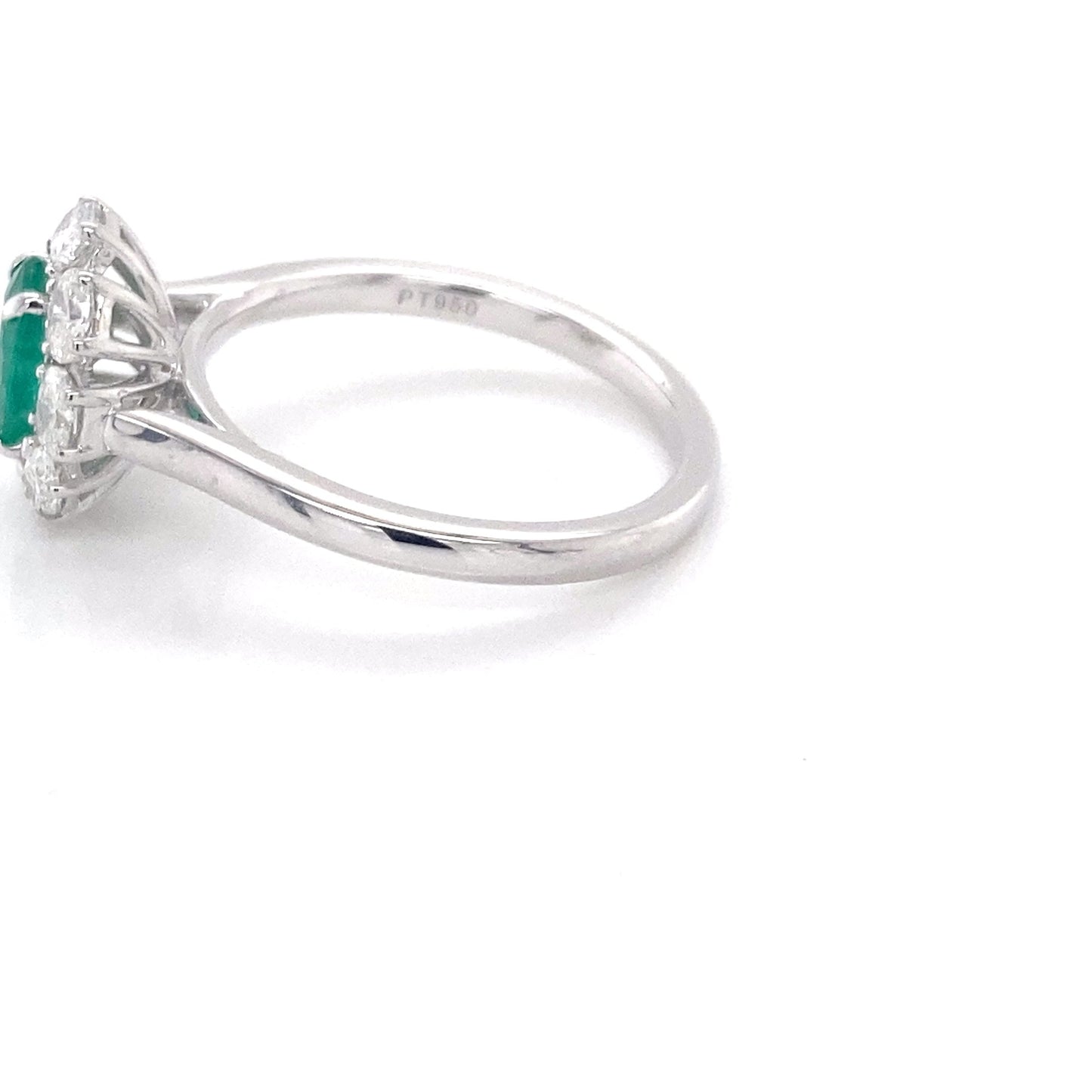 Oval shaped emerald and oval diamond cluster style ring Gardiner Brothers