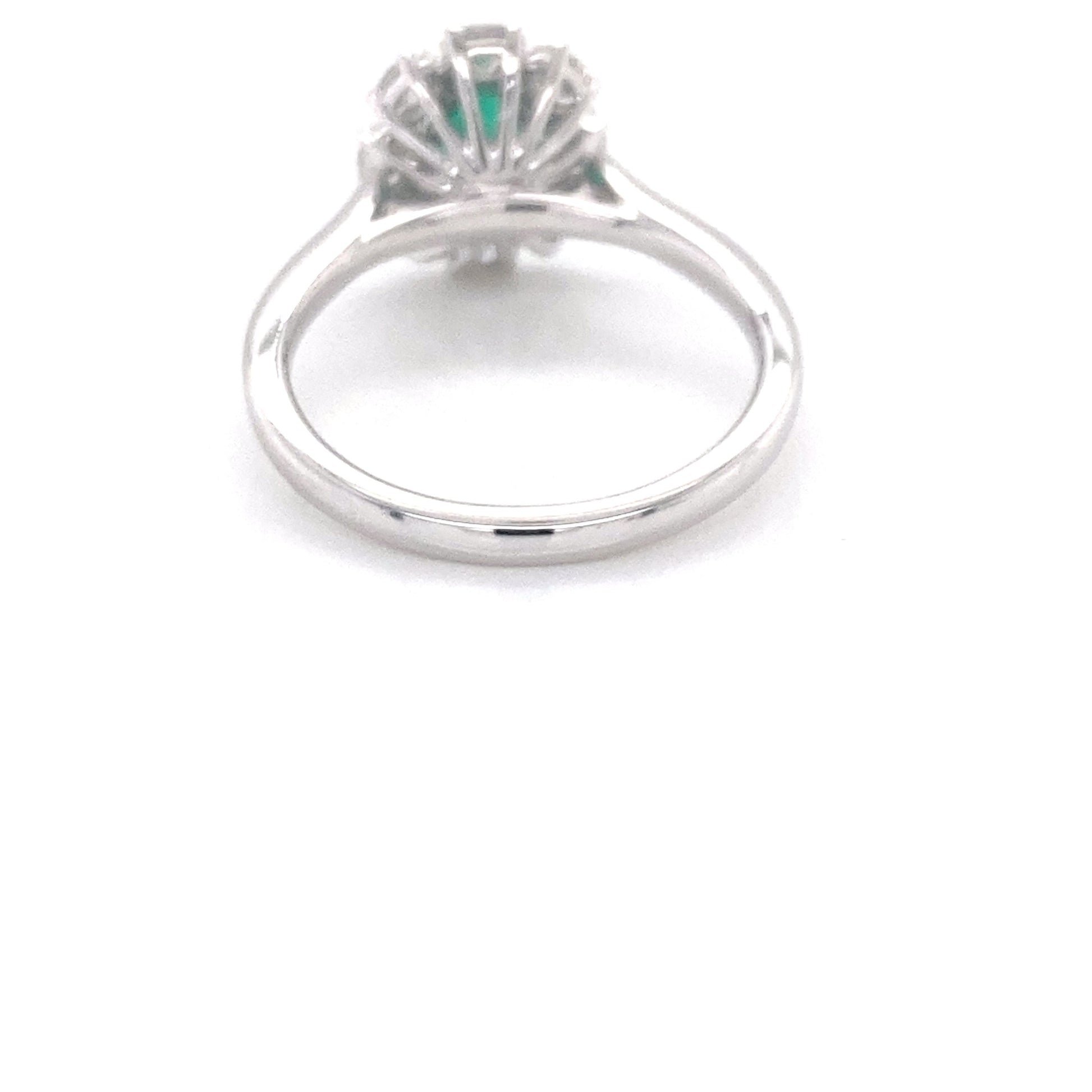 Oval shaped emerald and oval diamond cluster style ring Gardiner Brothers