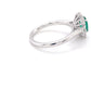 Oval shaped emerald and oval diamond cluster style ring Gardiner Brothers