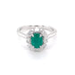 Oval shaped emerald and oval diamond cluster style ring Gardiner Brothers