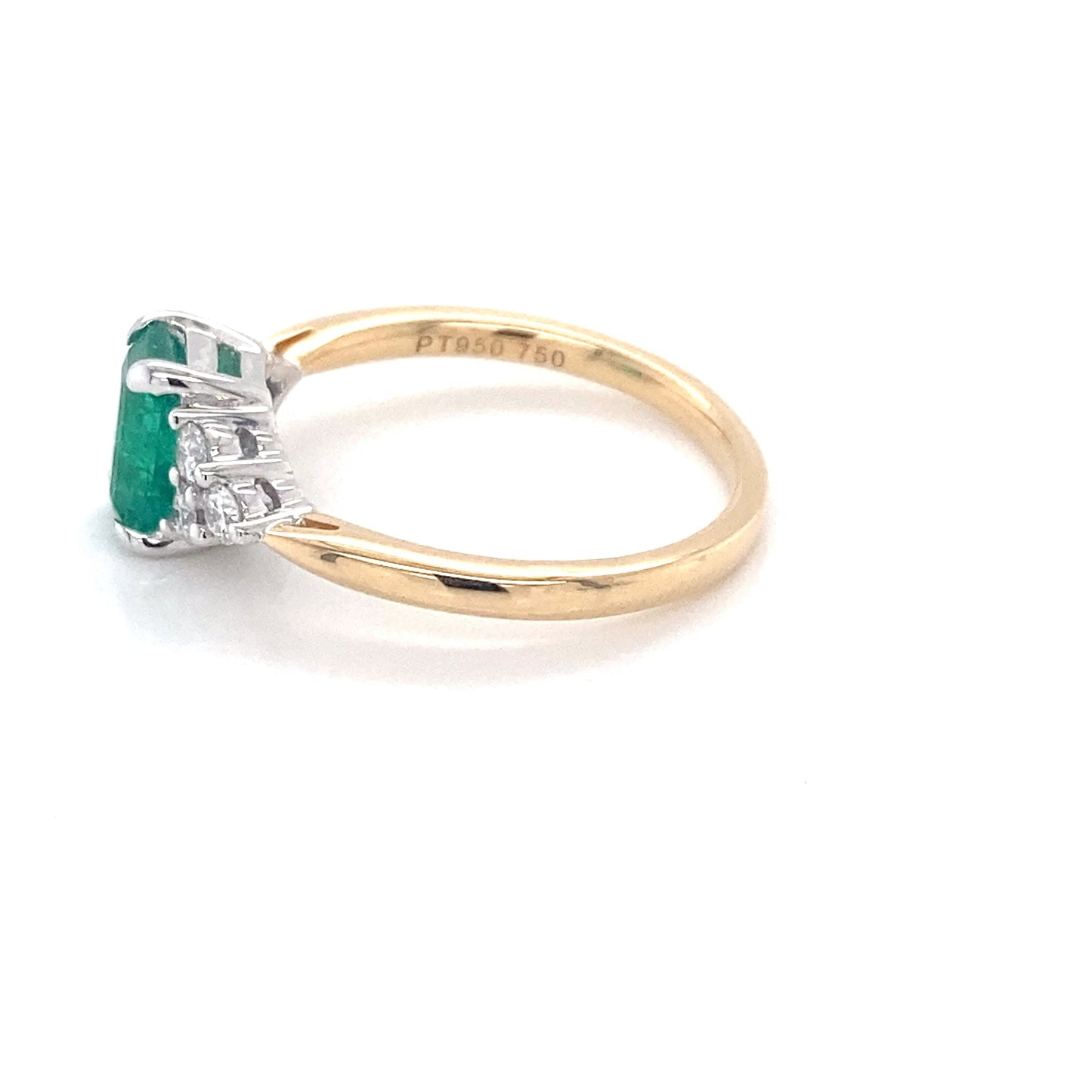 Octagonal shaped emerald and round brilliant cut diamond ring Gardiner Brothers
