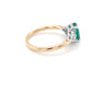 Octagonal shaped emerald and round brilliant cut diamond ring Gardiner Brothers