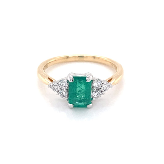 Octagonal shaped emerald and round brilliant cut diamond ring Gardiner Brothers