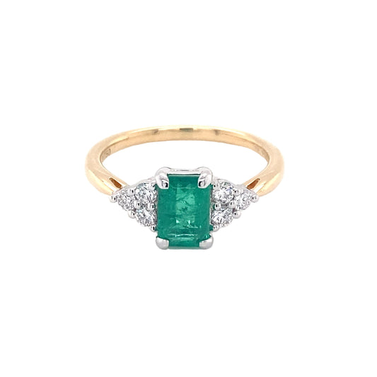 Octagonal shaped emerald and round brilliant cut diamond ring Gardiner Brothers