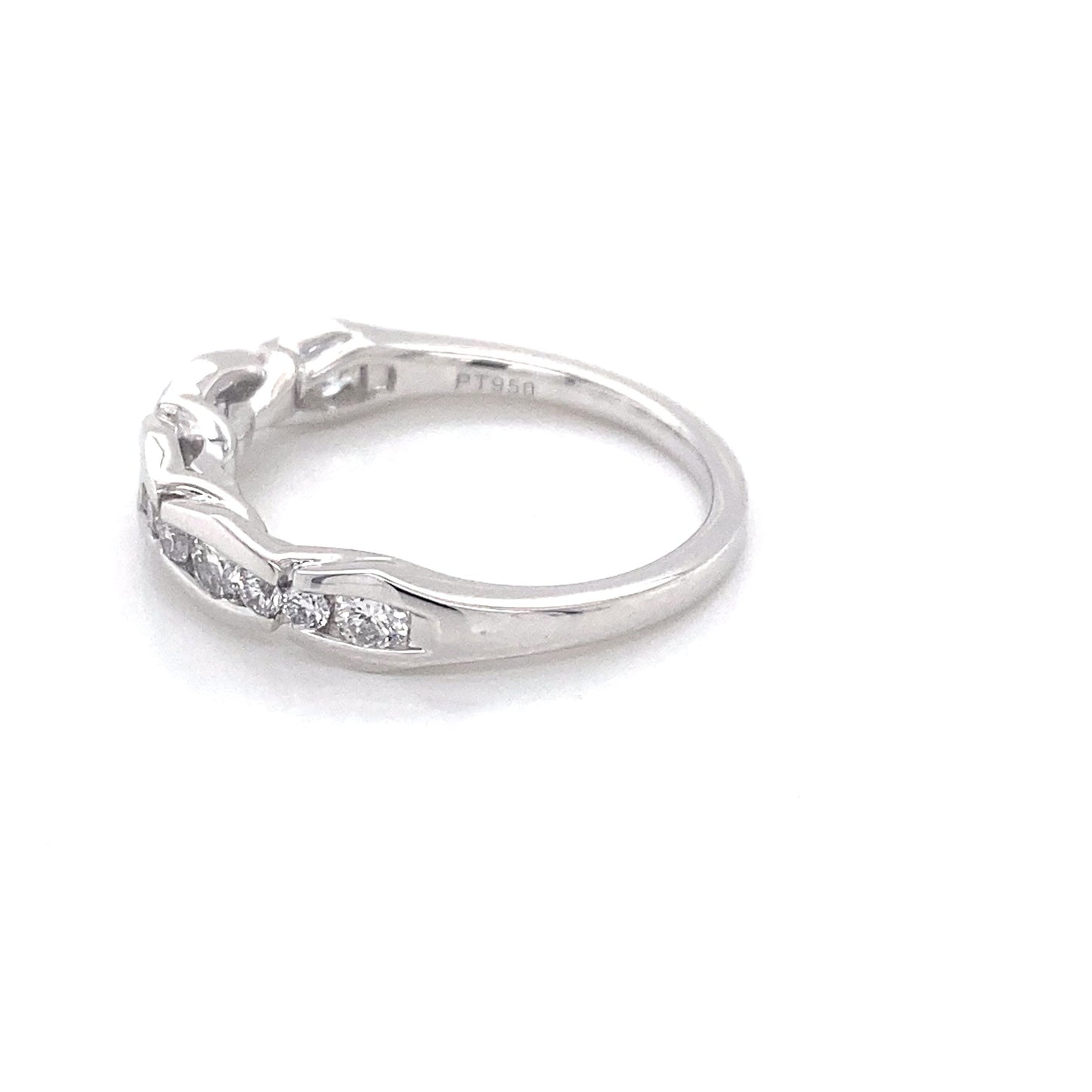 Platinum round brilliant cut diamond alternating size eternity ring Gardiner Brothers
