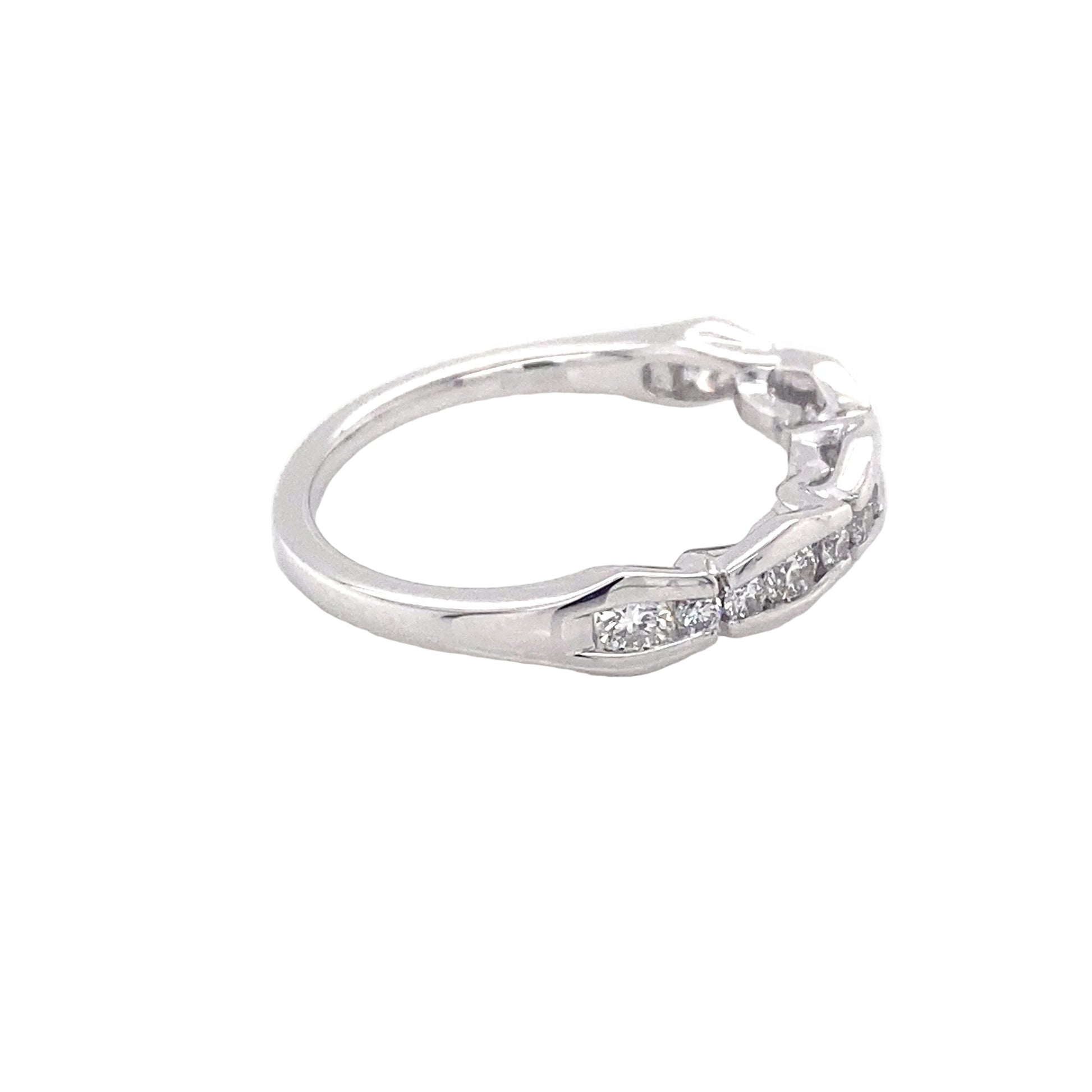 Platinum round brilliant cut diamond alternating size eternity ring Gardiner Brothers