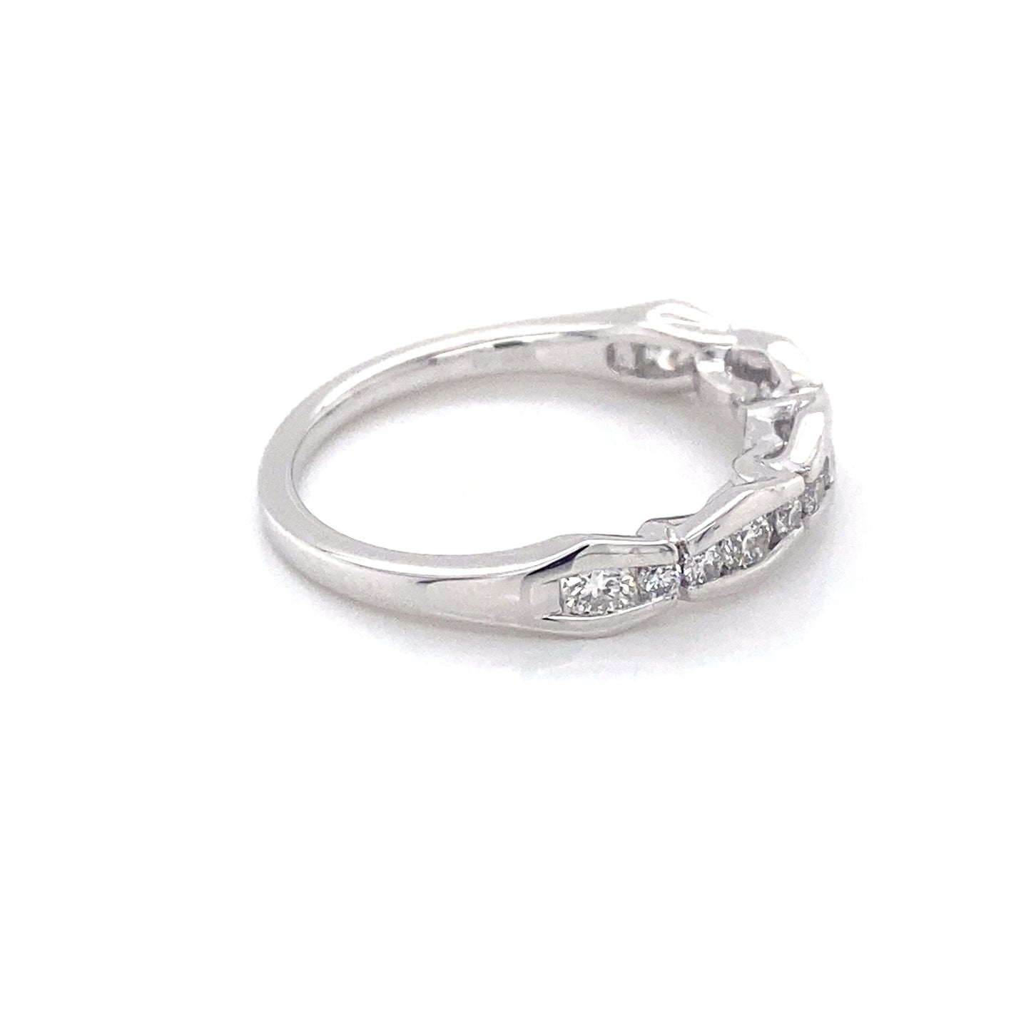 Platinum round brilliant cut diamond alternating size eternity ring Gardiner Brothers
