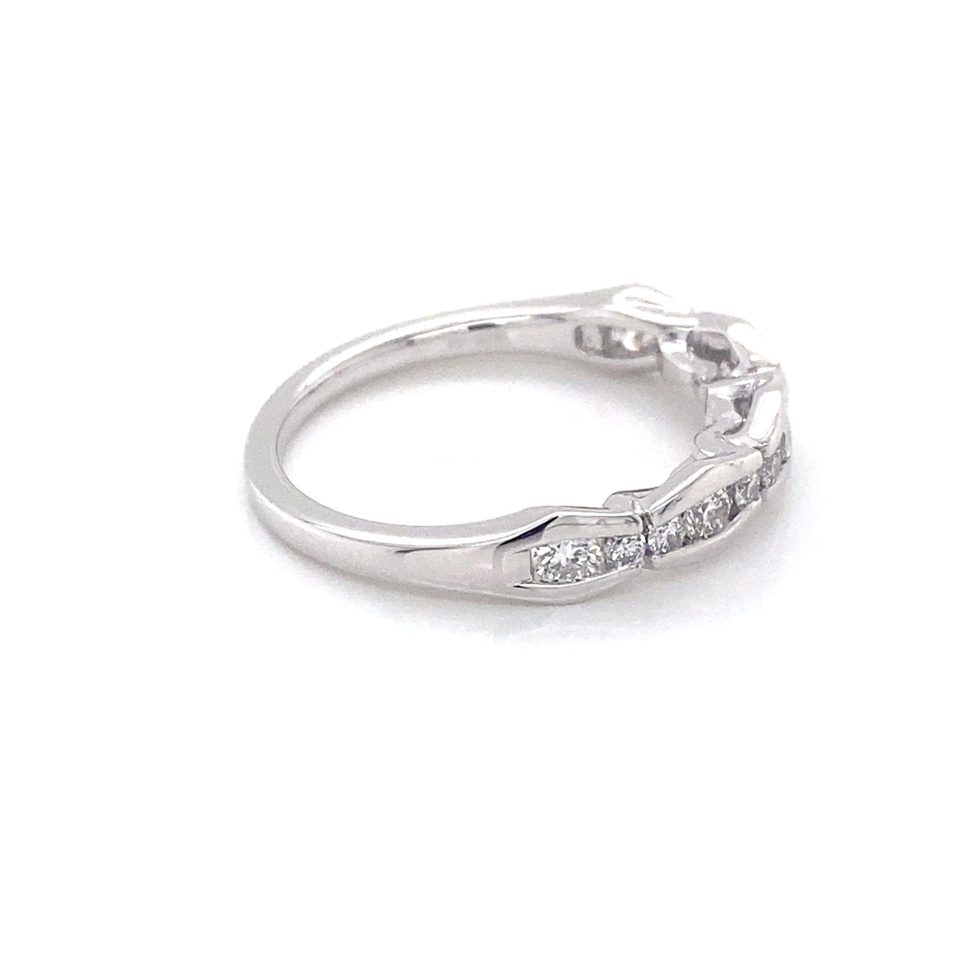Platinum round brilliant cut diamond alternating size eternity ring Gardiner Brothers
