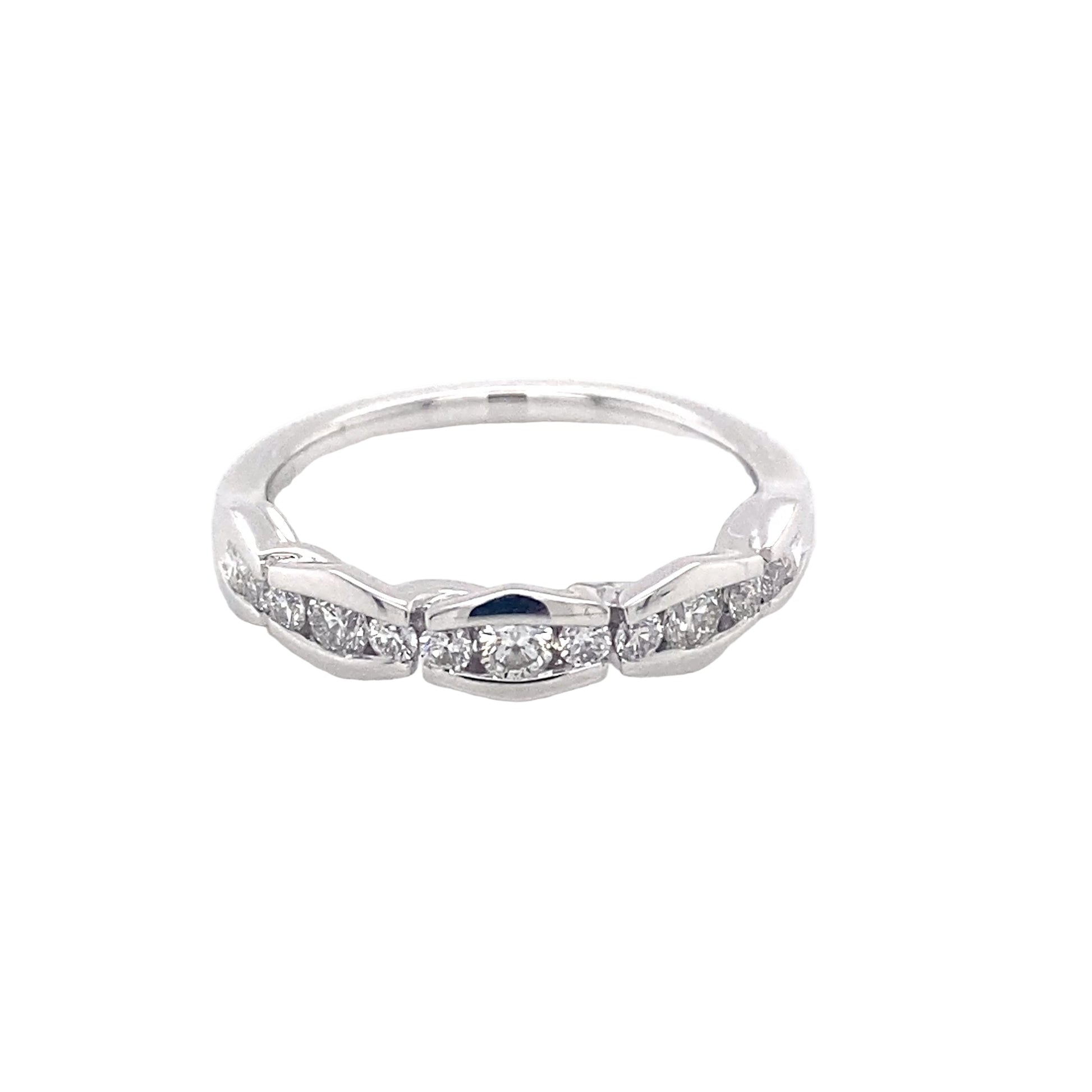 Platinum round brilliant cut diamond alternating size eternity ring Gardiner Brothers