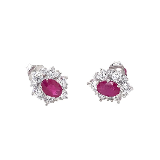 Oval Shaped Ruby and round brilliant cut diamond cluster style earrings Gardiner Brothers
